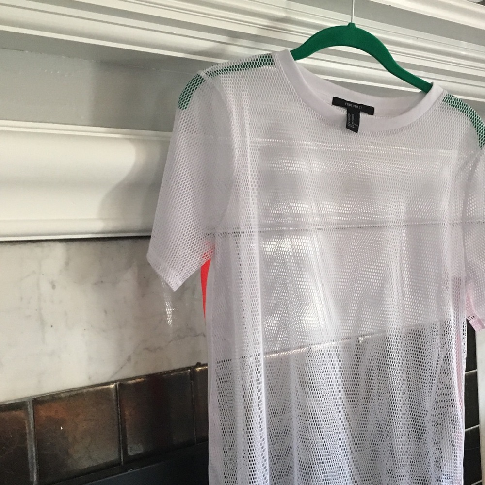 White mesh top with neon orange accent color